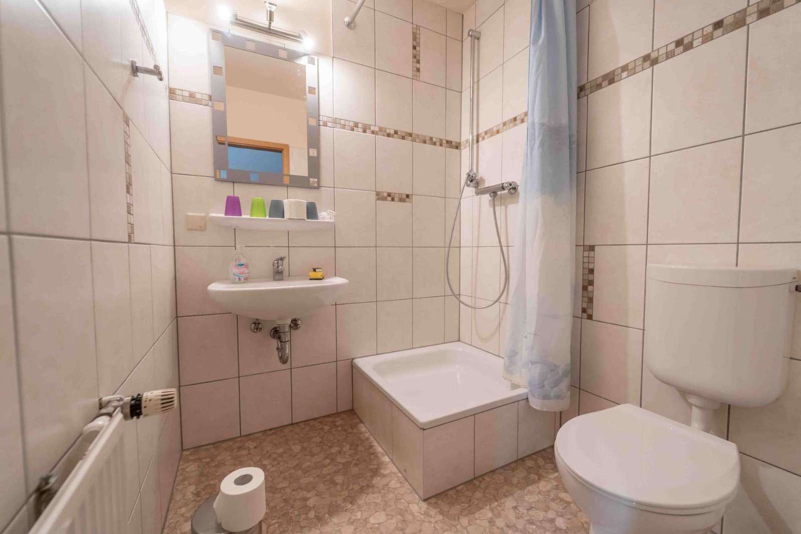 Gästehaus Bad OG Mittelwohnung